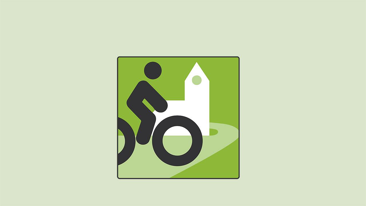 Radwegekirche Zeichen mit Fahrradfahrer im Vordergrund und weißer Kirche im Hintergrund
